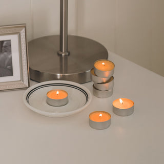 a group of candles on a table