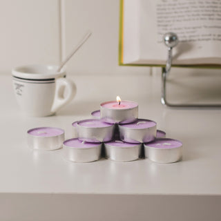 a group of candles in a pyramid