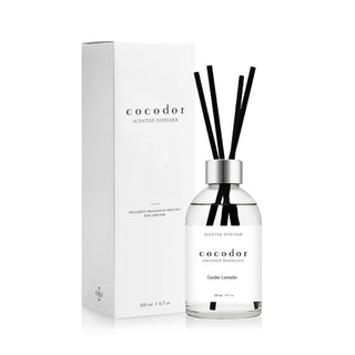 a bottle of fragrance with sticks