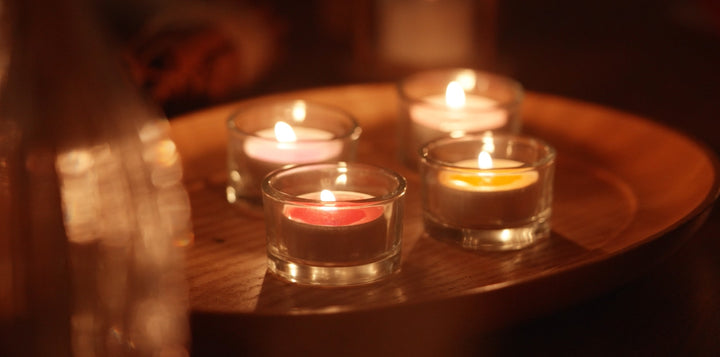 a group of candles on a table