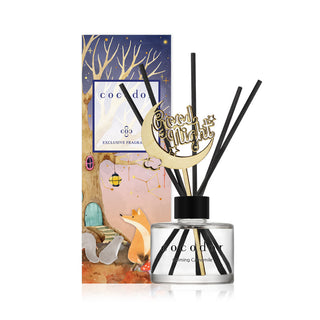 a bottle of reed diffuser with sticks