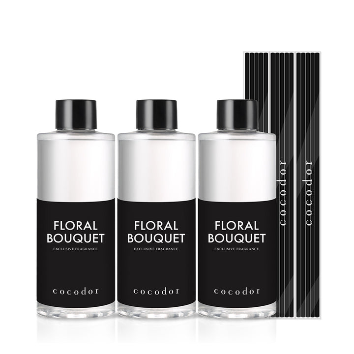 a group of bottles with black labels