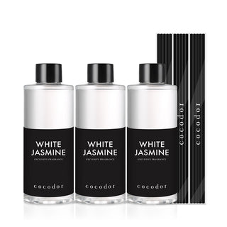 a group of bottles with black labels