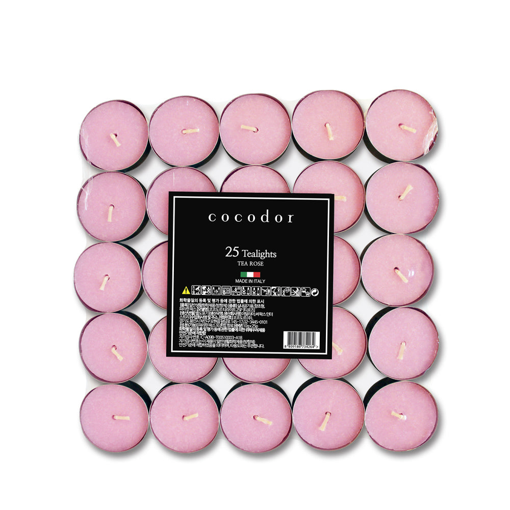 a group of pink candles
