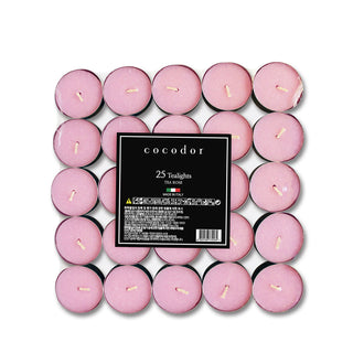 a group of pink candles